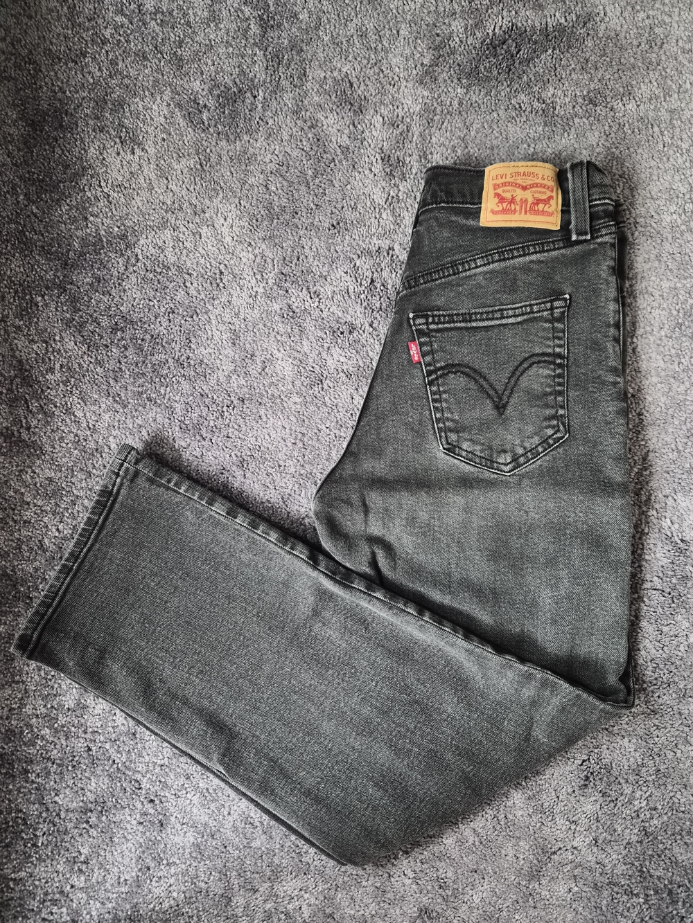Levi's Ribcage Straight Ankle Jeans In Washed Black